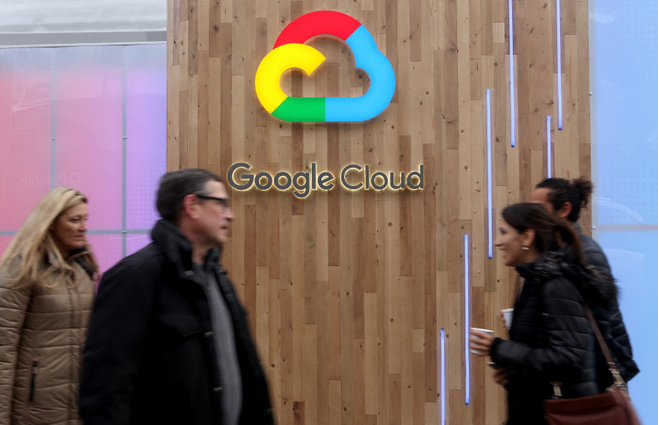 DAVOS, SWITZERLAND - JANUARY 25:  Pedestrians pass a Google Cloud logo on January 25, 2018 in Davos, Switzerland. The Google Cloud Platform is a set of cloud computing services that includes online management tools to manage data storage, data analytics and other services.  (Photo by Adam Berry/Getty Images)