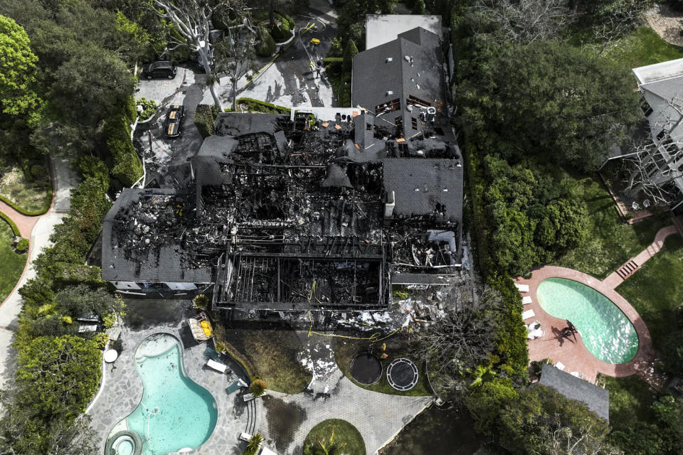 Image: A fire-damaged property, which appears to belong to Cara Delevingne (Jae C. Hong / AP)