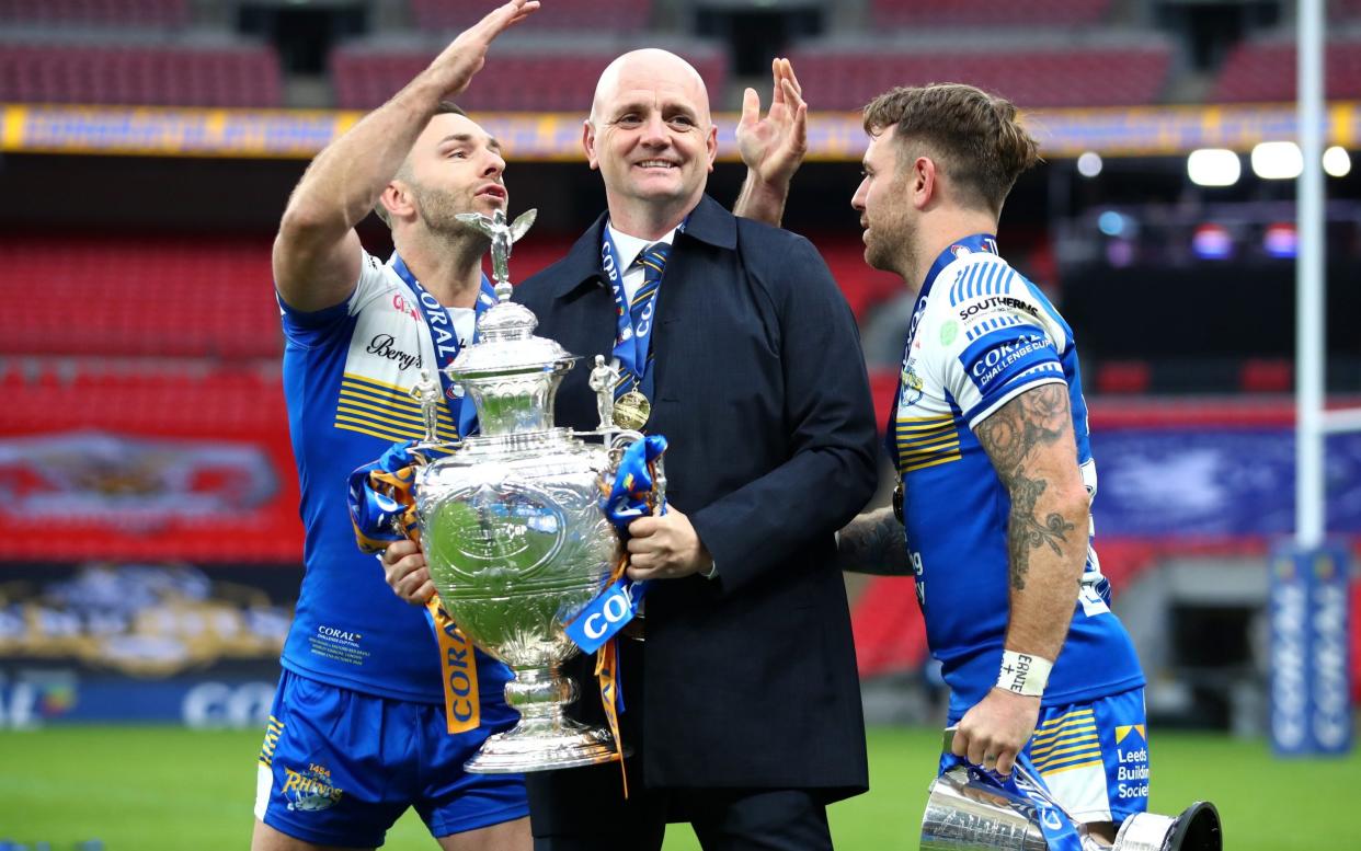 Leeds Rhinos Head Coach Richard Agar, Richie Myler and Luke Gale of Leeds Rhinos celebrate with the trophy  - Getty Images