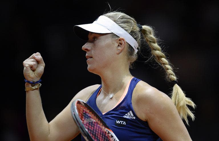 Germany's Angelique Kerber reacts in her semifinal match against Madison Brengle from the USA at the WTA Porsche Tennis Grand Prix in Stuttgart, southwestern Germany, on April 25, 2015