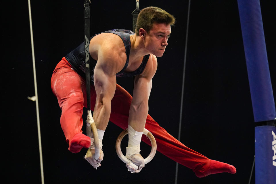 Brody Malone competes on the still rings during the men's U.S. Olympic Gymnastics Trials Thursday, June 24, 2021, in St. Louis. (AP Photo/Jeff Roberson)