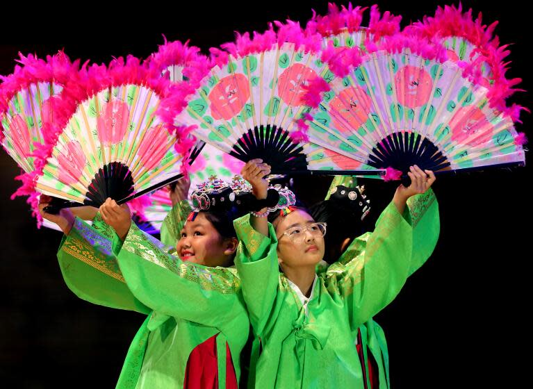 Los Angeles, CA - Students from Cahuenga Elementary School perform a Korean fan dance before Los Angerles Unifoed School District Superintendent Alberto M. Carvalho delivered an Opening of Schools Address at the Walt Disney Concert Hall in Los Angeles on Friday, Aug. 4, 2023. (Luis Sinco / Los Angeles Times)