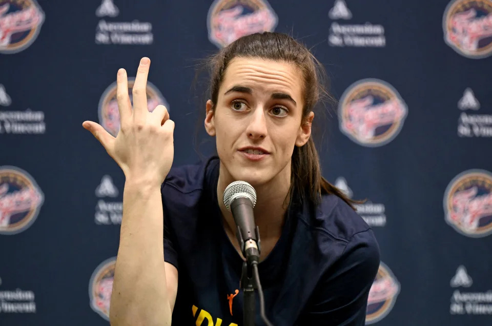 WASHINGTON, DC - JUNE 07: Caitlin Clark #22 of the Indiana Fever talks to the media before the game against the Washington Mystics at Capital One Arena on June 07, 2024 in Washington, DC.  NOTE TO USER: User expressly acknowledges and agrees that, by downloading and or using this photograph, User is consenting to the terms and conditions of the Getty Images License Agreement. (Photo by G Fiume/Getty Images)