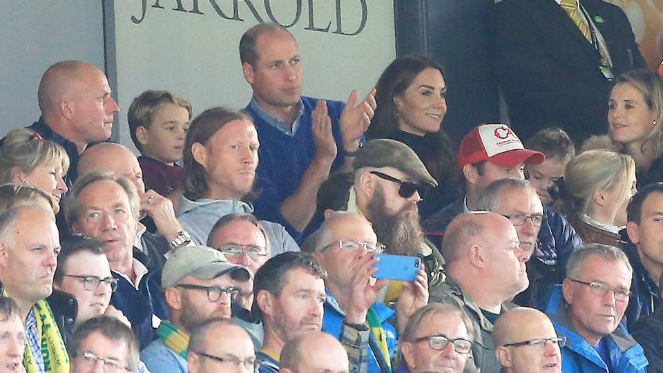 Prince William is seen here watching an Aston Villa match from the stands.