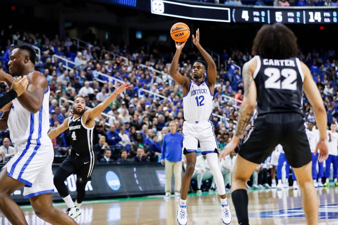 Kentucky’s Antonio Reeves (12) averaged 14.4 points and shot a career-best 39.8% percent from three-point range this past season.