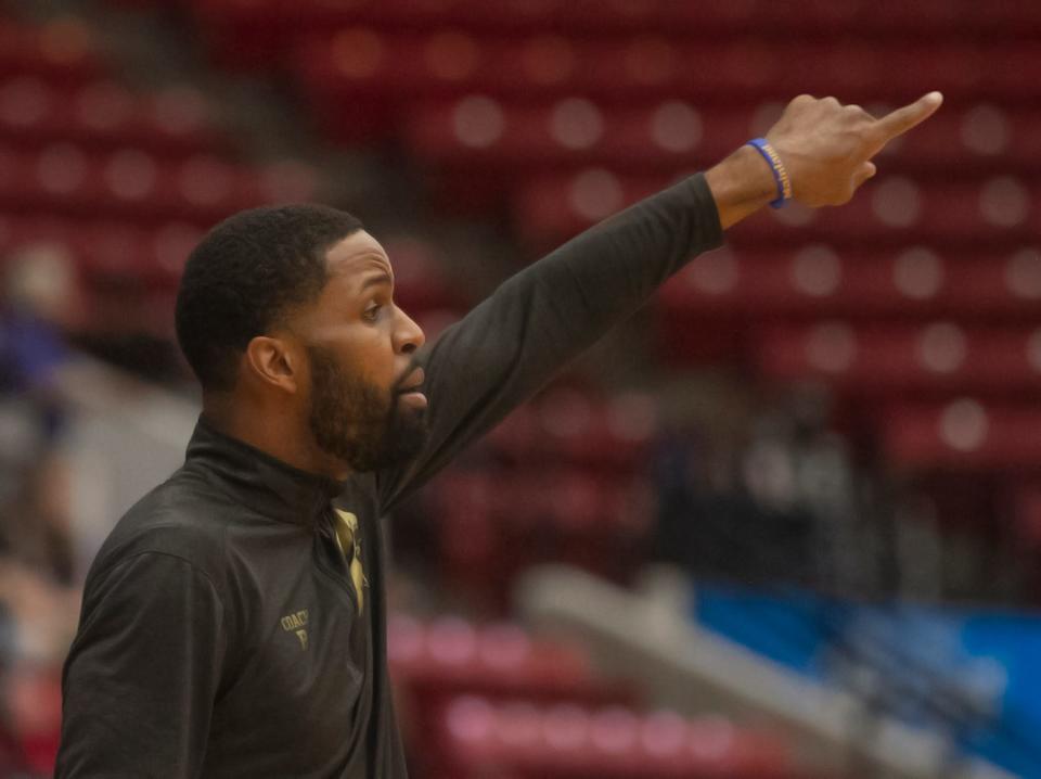 Mainland coach Brandon Stewart instructs his players against American Heritage during the 5A state championship game, Saturday, Feb. 25, 2023 in Lakeland.