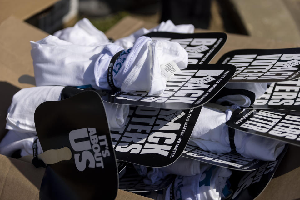 Black Voters Matter fans, shirts and wristbands were distributed along with food and toys as part of the program in the John Lewis Advancement Act Day of Action, a voter education and engagement event Saturday, May 8, 2021, at Carver High School in Montgomery, Ala. (AP Photo/Vasha Hunt)