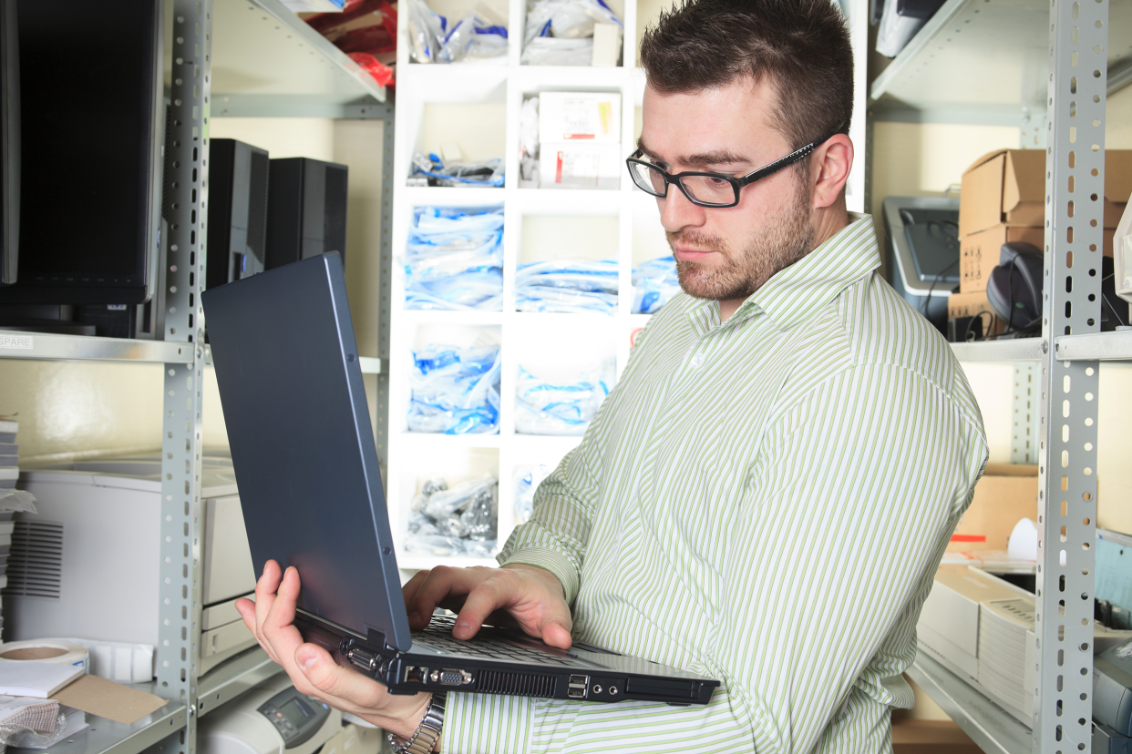 Man fixing a computer