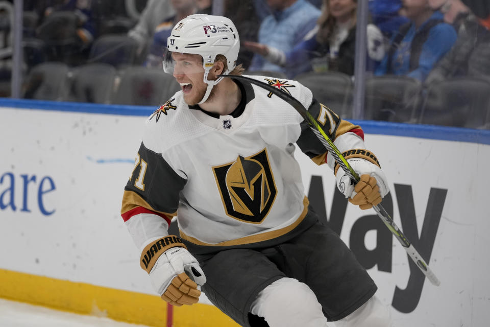 Vegas Golden Knights' William Karlsson celebrates after scoring during the first period of an NHL hockey game against the St. Louis Blues Sunday, March 12, 2023, in St. Louis. (AP Photo/Jeff Roberson)