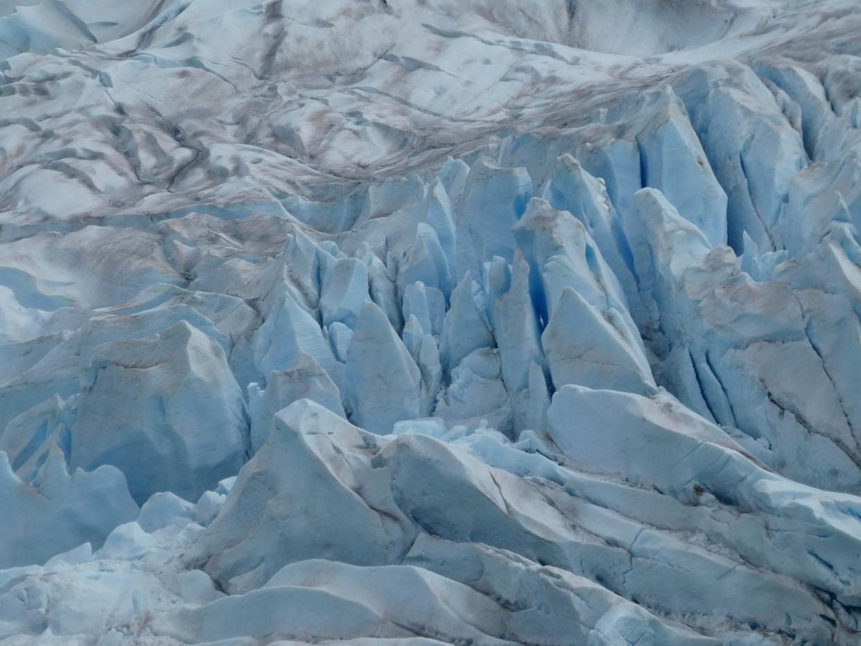 The jagged surface of the Mendenhall Glacier is seen on June 8, 2023, in Juneau, Alaska. The glacier is a top attraction in Juneau, Alaska's capital city.