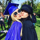 <p>School’s out for the summer — and forever! — for Lisa Rinna and Harry Hamlin’s elder daughter, Delilah Belle. The blonde, 18, posed for her mama at her June 8 commencement, doing some fishy kisses with younger sib Amelia Gray. “Yes she did!!!” wrote reality star Rinna. “Congratulations @delilahbelle. We are so very proud of you!!!!#graduation #nextchapter.” As for that next chapter, it will involve modeling. Like Sistine Stallone and Presley Gerber, she graduates with a modeling contract. (Photo: Lisa Rinna via Instagram) </p>