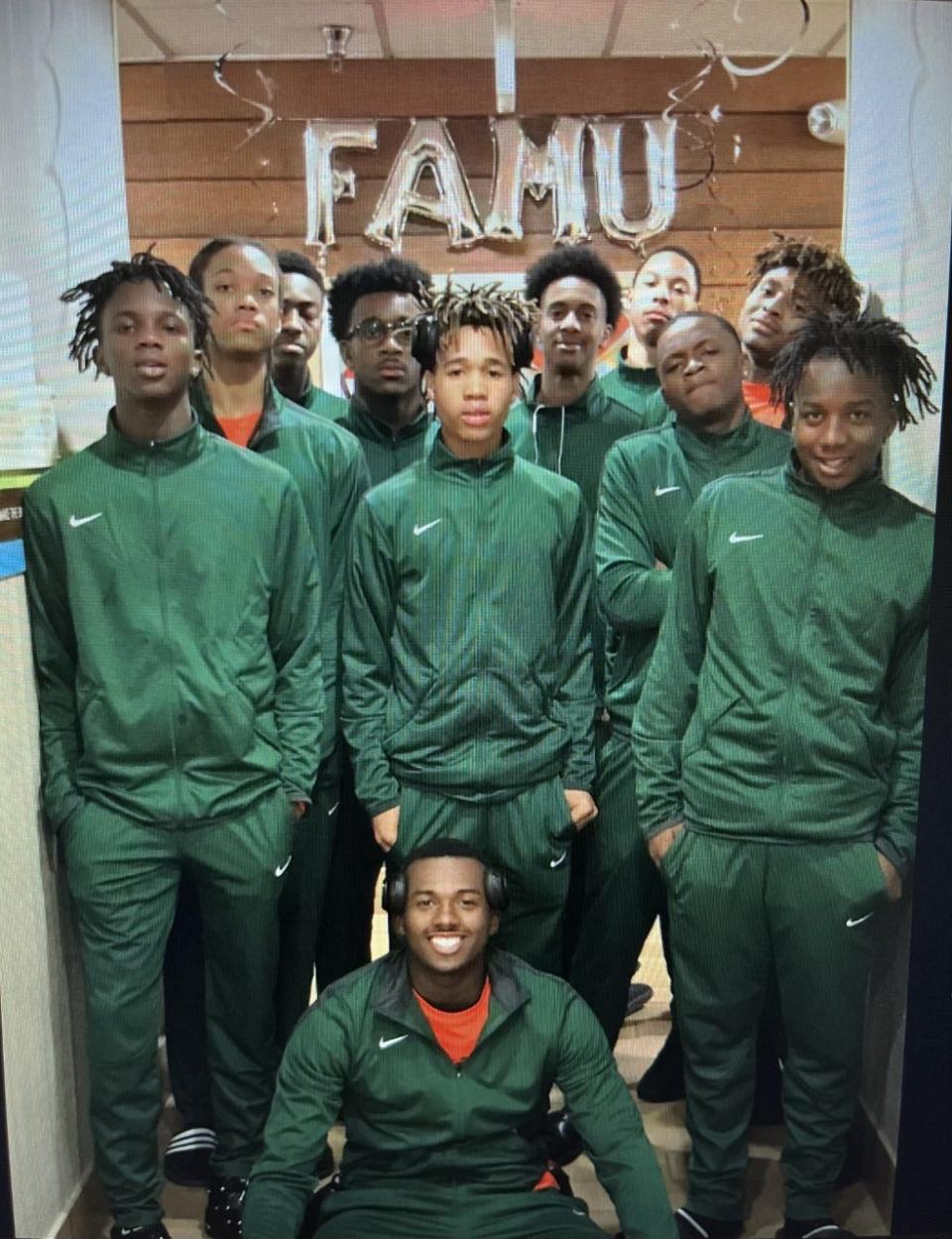 Travis Huntley, far left, stands beside his FAMU DRS teammates.