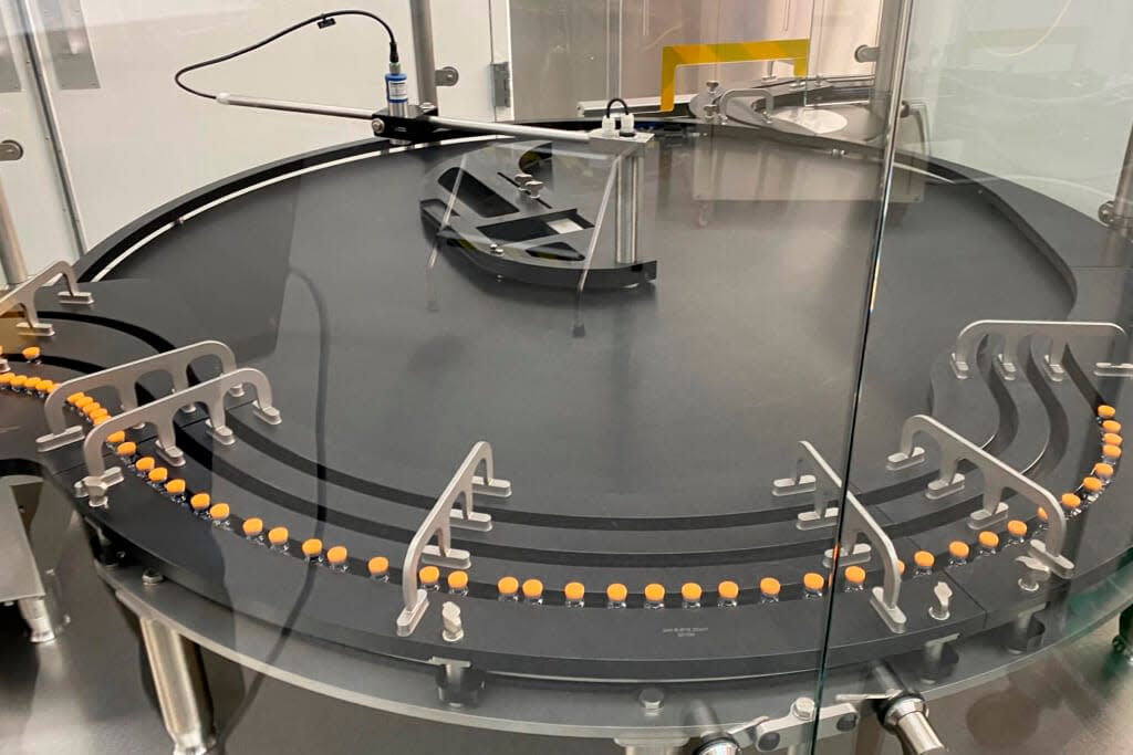 This photo provided by Pfizer in October 2022 shows the manufacturing of the company’s COVID-19 bivalent vaccine for children ages 5-11. The U.S. on Wednesday authorized updated COVID-19 boosters for children as young as 5, seeking to expand protection ahead of an expected winter wave. (Pfizer via AP)