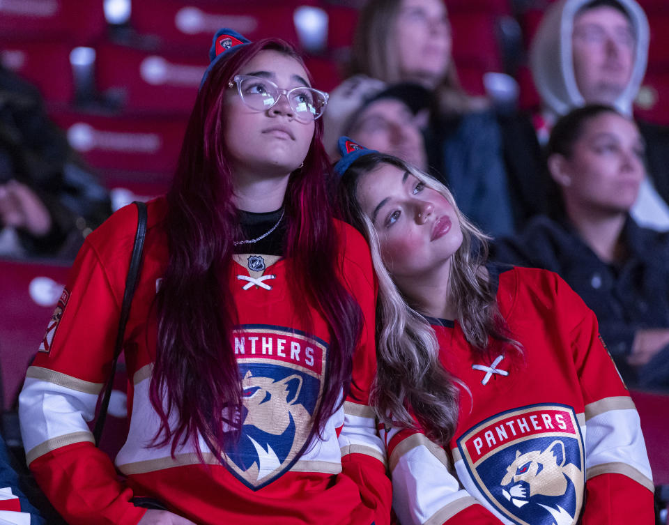 Florida Panthers fans react during a watch party for Game 6 of the NHL hockey Stanley Cup Final between the Panthers and the Edmonton Oilers, Friday, June 21, 2024, in Sunrise, Fla. The Oilers won 5-1 to even the series. (Matias J. Ocner/Miami Herald via AP)