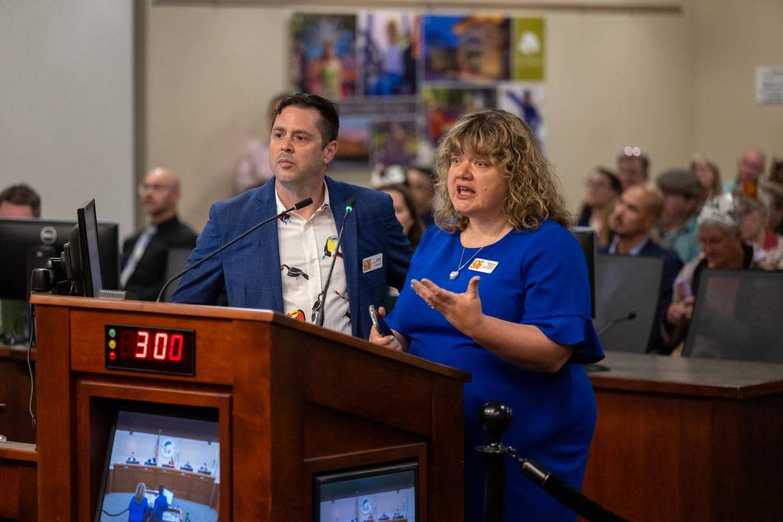 Elizabeth Stallard and Jason Jacobs of the Sacramento Zoological Society ask Elk Grove City Councilman Kevin Spease during the council meeting about the zoo’s move on Wednesday why he didn’t share his concerns about the relocation to Elk Grove earlier.