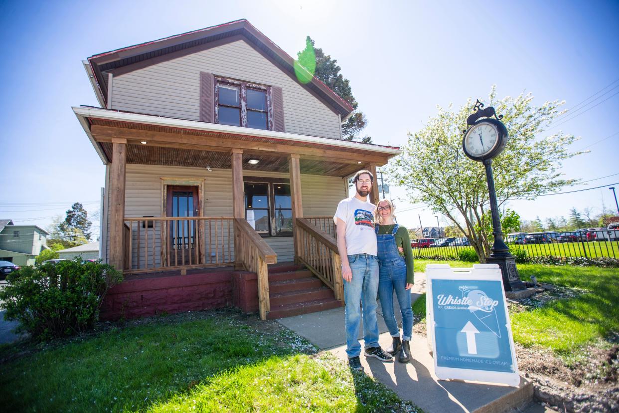 Spencer and Rachael Bainter pose for a portrait at the new location for The Whistle Stop Ice Cream Shop on  Monday, May 9, 2022, near Howard Park.