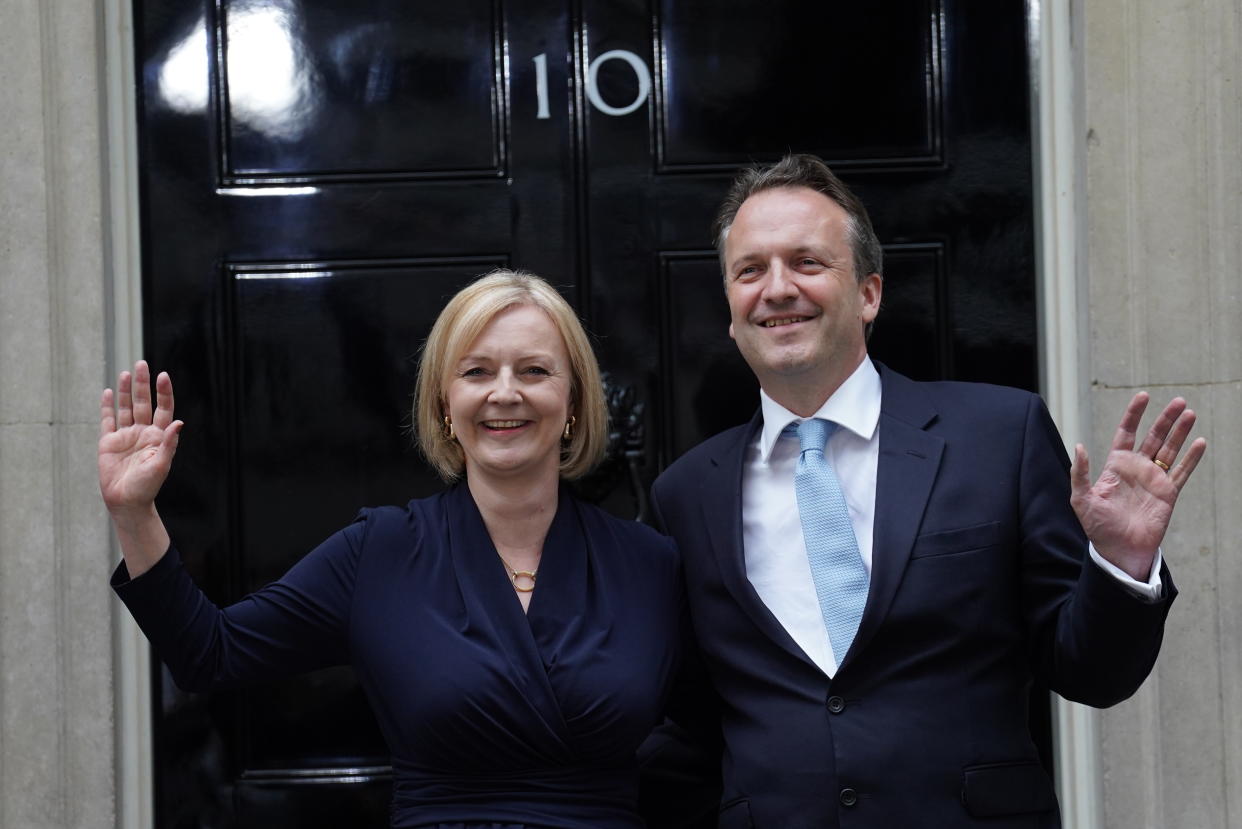 New Prime Minister Liz Truss and her husband Hugh O'Leary wave outside 10 Downing Street, London, after meeting Queen Elizabeth II and accepting her invitation to become Prime Minister and form a new government. Picture date: Tuesday September 6, 2022. (Photo by Stefan Rousseau/PA Images via Getty Images)