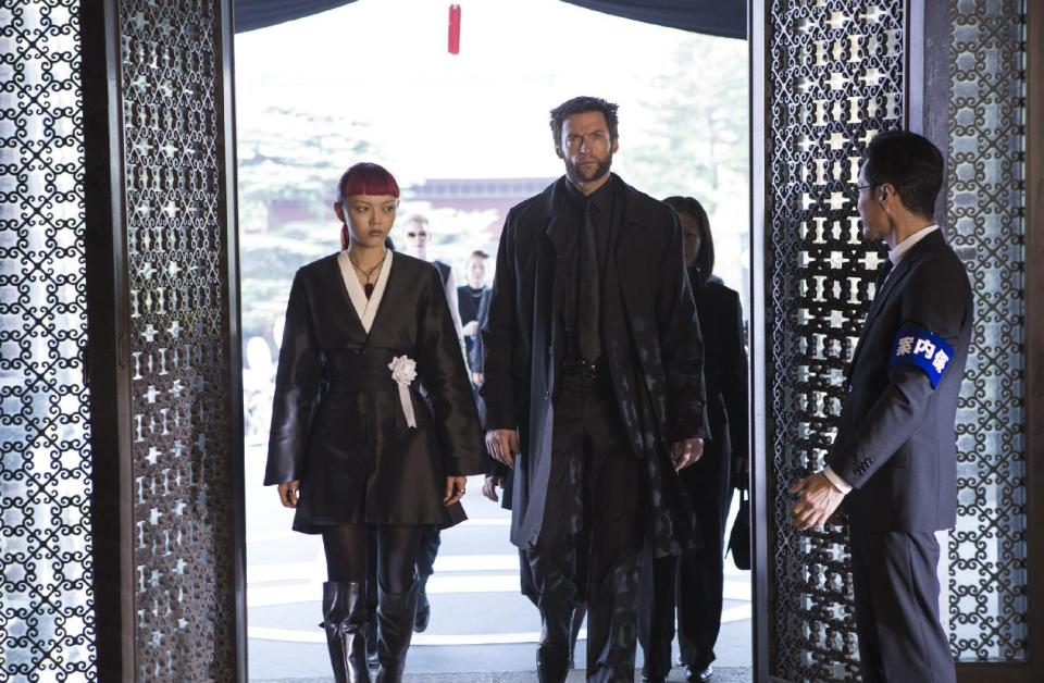 This publicity image released by 20th Century Fox shows Rila Fukushima, left, and Hugh Jackman in a scene from "The Wolverine." (AP Photo/20th Century Fox, Ben Rothstein)