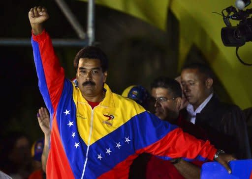 Photo Par Luis Acosta - Le président par intérim du Venezuela, Nicolas Maduro, a été déclaré vainqueur, d'une très courte tête, à l'élection de dimanche pour succéder à Hugo Chavez, une victoire contestée par l'opposition qui exige un nouveau décompte de l'ensemble des bulletins de vote