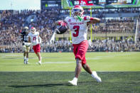 Fresno State wide receiver Erik Brooks (3) celebrates scoring a touchdown against Purdue during the second half of an NCAA college football game in West Lafayette, Ind., Saturday, Sept. 2, 2023. Fresno State won 38-35. (AP Photo/AJ Mast)