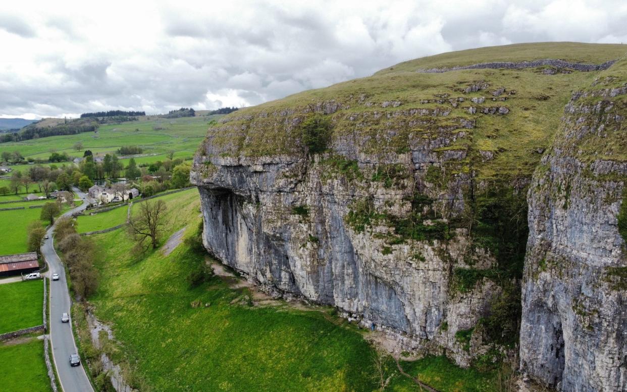 Kilnsey Crag is one of the big three limestone crags in the Yorkshire Dales National Park - the place to go if you like crags - Savills / SWNS