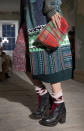 <p>A tartan fabric clutch bag also did the rounds at the heritage label’s SS18 show. <em>[Photo: PA]</em> </p>