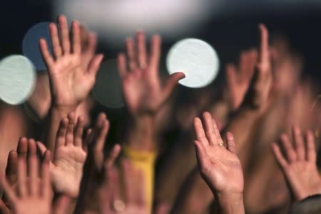 Evangelical Christians worship during the "Jesus Parade" in downtown Brasilia August 14, 2014. REUTERS/Joedson Alves