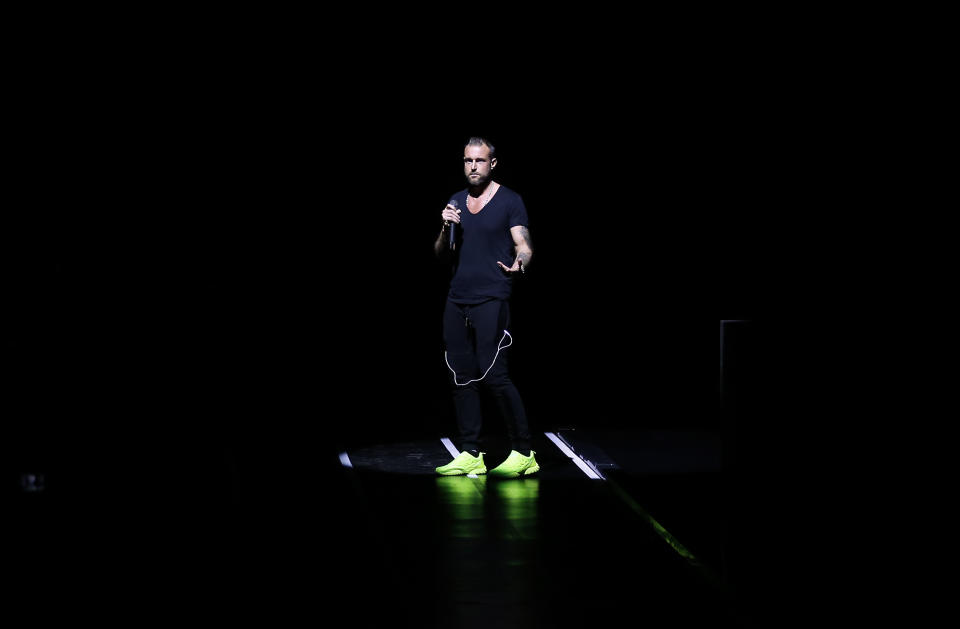 Fashion designer Philipp Plein speeches before presenting his Plein Sport men's Fall-Winter 2017-2018 collection, part of the Milan Fashion Week, unveiled in Milan, Italy, Saturday, Jan. 14, 2017. (AP Photo/Antonio Calanni)