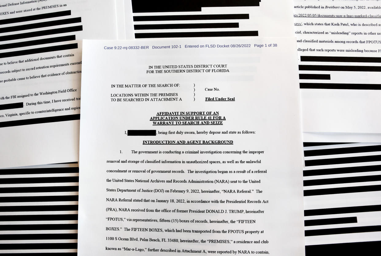 Pages from the redacted version of the FBI search warrant affidavit for Trump's Mar-a-Lago estate