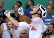 2016 Rio Olympics - Cycling Track - Final - Men's Omnium 40km Points Race - Rio Olympic Velodrome - Rio de Janeiro, Brazil - 15/08/2016. Elia Viviani (ITA) of Italy reacts after winning gold. REUTERS/Eric Gaillard TPX IMAGES OF THE DAY