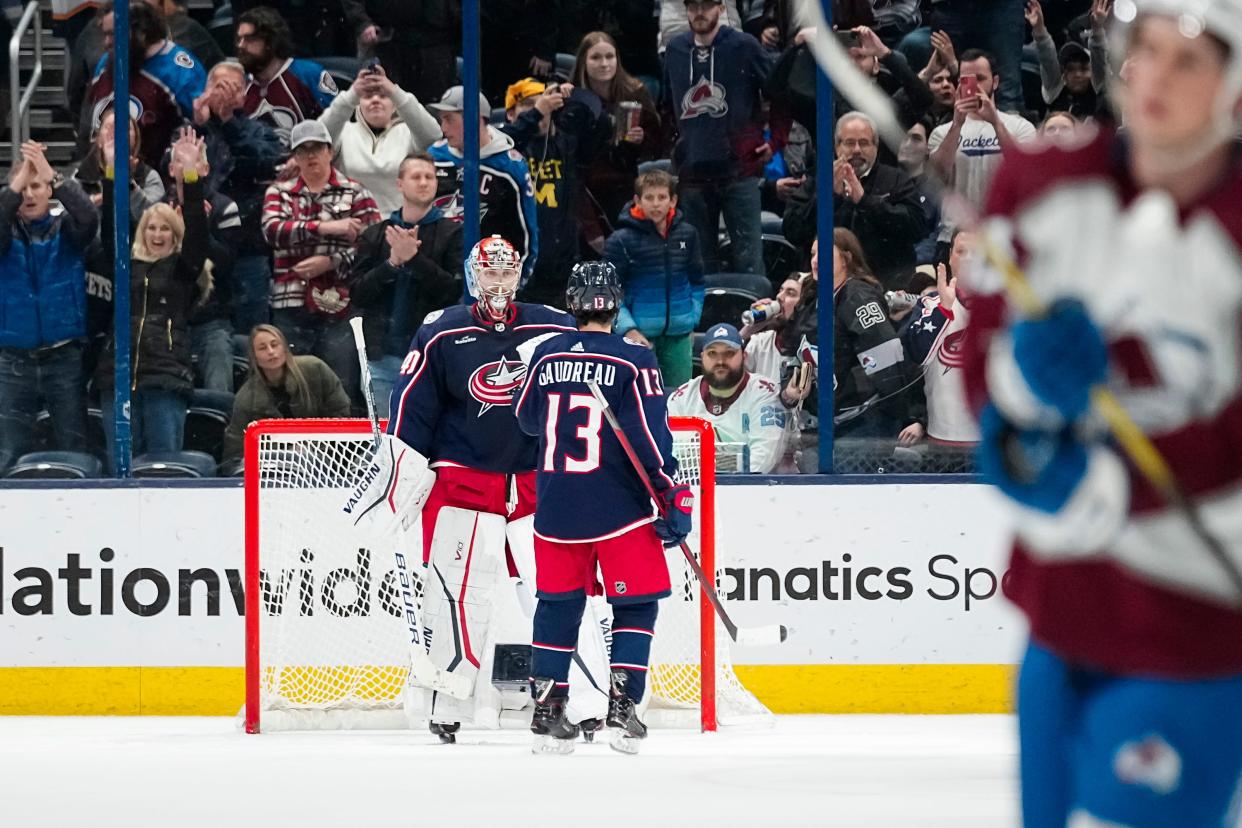 Apr 1, 2024; Columbus, Ohio, USA; Columbus Blue Jackets left wing Johnny Gaudreau (13) congratulates goaltender Daniil Tarasov (40) following the NHL hockey game against the Colorado Avalanche at Nationwide Arena. The Blue Jackets won 4-1.