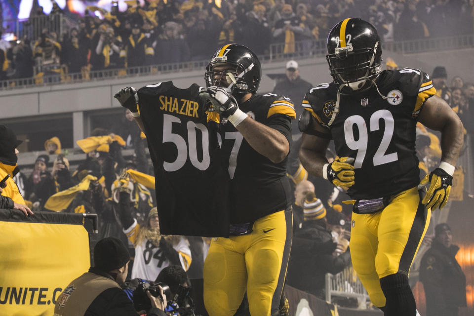 <p>Pittsburgh Steelers Defensive End Cameron Heyward (97) and Pittsburgh Steelers Linebacker James Harrison (92) run out on the field with teammate Pittsburgh Steelers Linebacker Ryan Shazier (50) jersey during the game between the Baltimore Ravens and the Pittsburgh Steelers on December 10, 2017 at Heinz Field in Pittsburgh, Pa. (Photo by Mark Alberti/ Icon Sportswire) </p>