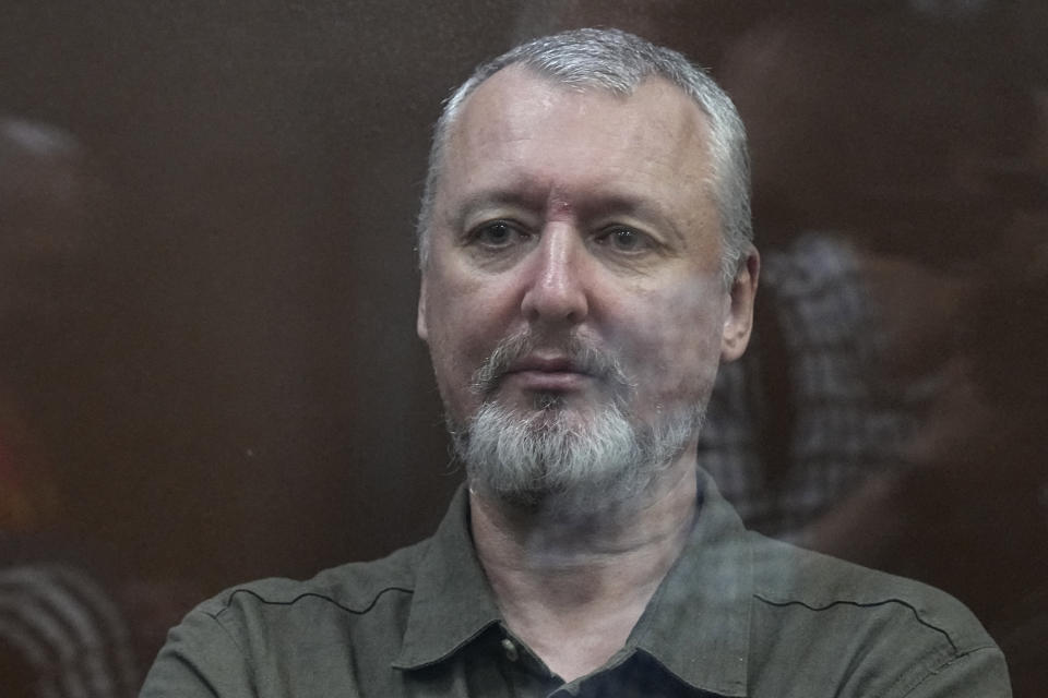 Igor Girkin also know as Igor Strelkov, the former military chief for Russia-backed separatists in eastern Ukraine, sits in a glass cage in a courtroom at the Moscow's Meshchansky District Court in Moscow, Russia, Friday, July 21, 2023. A prominent Russian hard-line nationalist who accused President Vladimir Putin of weakness and indecision in Ukraine was detained Friday on charges of extremism, a signal the Kremlin has toughened its approach with hawkish critics after last month's abortive rebellion by the Wagner mercenary company. (AP Photo/Alexander Zemlianichenko, Pool)