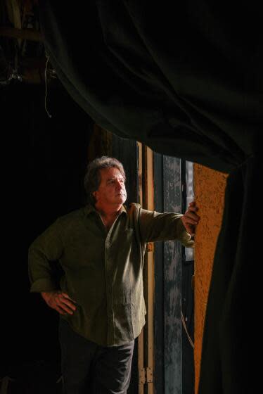 Los Angeles, CA - February 28: Stephen Sachs, founding artistic director of Fountain Theatre who will be stepping down from his post, poses for a portrait off stage at Fountain Theater where he has been released to on Wednesday, Feb. 28, 2024 in Los Angeles, CA. His new play, "Fatherland," is about a Jan. 6 case involving a son who turned his father in to the FBI. (Dania Maxwell / Los Angeles Times)