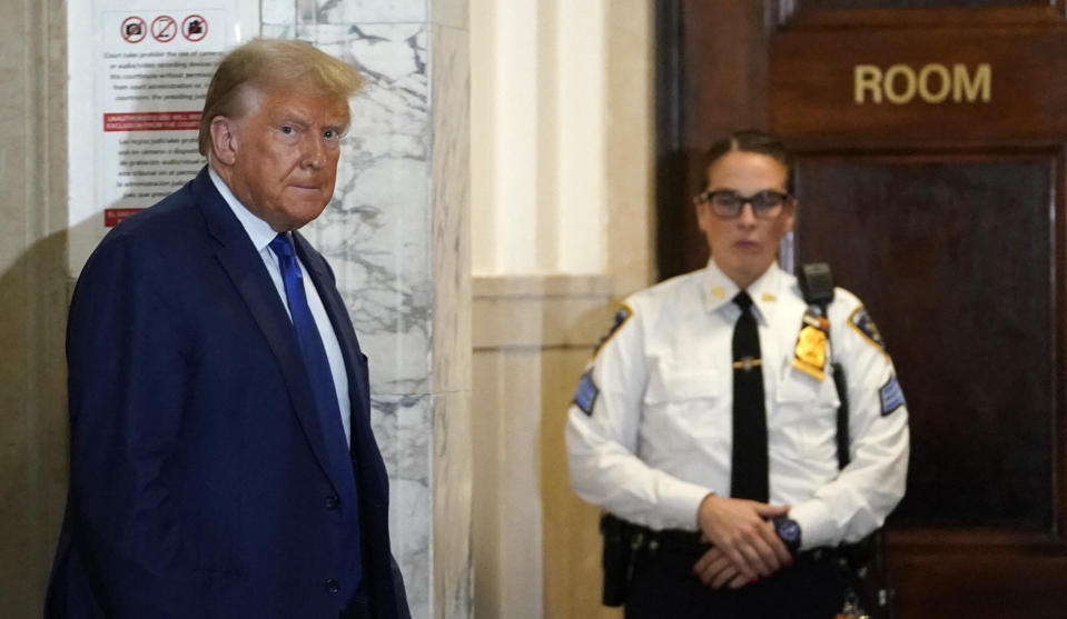 Former President Donald Trump speaks to the press during a break in his fraud trial in New York on Oct. 25, 2023.  / Credit: TIMOTHY A. CLARY/AFP via Getty Images