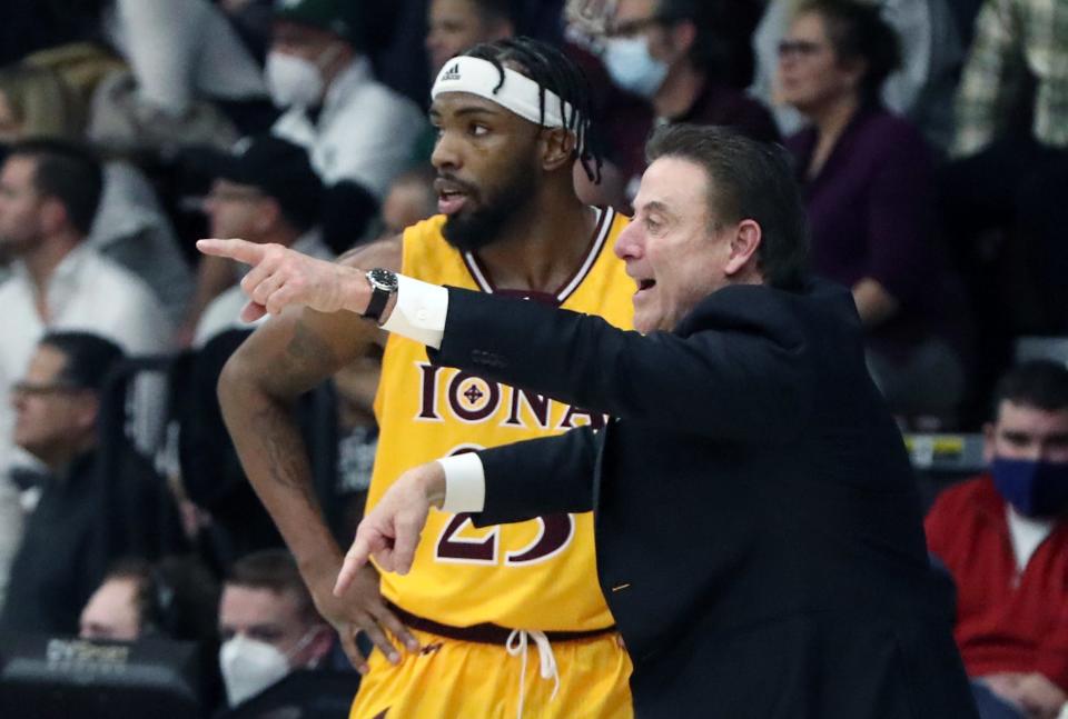 Iona head coach Rick Pitino talks with Nelly Junior Joseph during a game with Manhattan at Iona Jan. 14, 2022. Iona won 88-67.