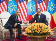 Ethiopian President Mulatu Teshome (R) and US President Barack Obama shake hands during a meeting at the National Palace in Addis Ababa on July 27, 2015