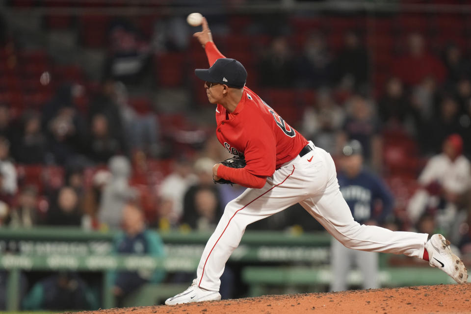 Boston Red Sox's Justin Garza delivers a pitch to a Seattle Mariners player in the ninth inning of a baseball game, Wednesday, May 17, 2023, in Boston. (AP Photo/Steven Senne)