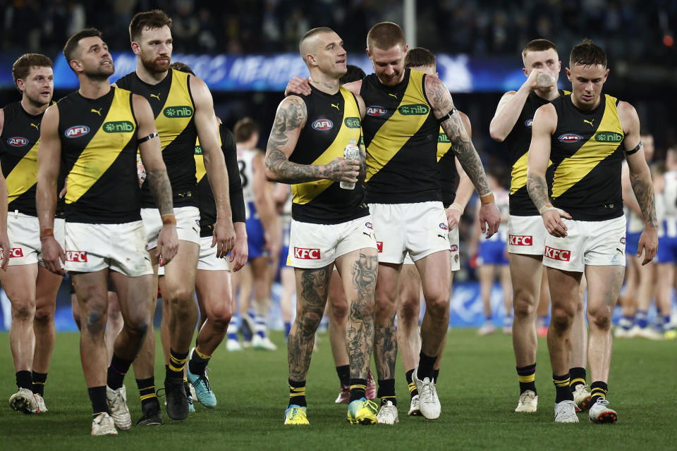 MELBOURNE, AUSTRALIA - AUGUST 03: Dustin Martin of the Tigers (C) chats with Nathan Broad of the Tigers after the round 21 AFL match between North Melbourne Kangaroos and Richmond Tigers at Marvel Stadium, on August 03, 2024, in Melbourne, Australia. (Photo by Daniel Pockett/Getty Images)