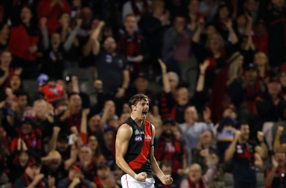 Joe Daniher of the Bombers celebrates a goal during the 2019 AFL round 05 match between the North Melbourne Kangaroos and the Essendon Bombers at Marvel Stadium on April 19, 2019 in Melbourne, Australia. (Photo by Michael Willson/AFL Photos)