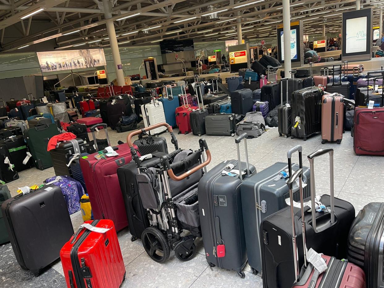 A picture showing a line up of luggage at Heathrow Airport in London, in Terminal 5.