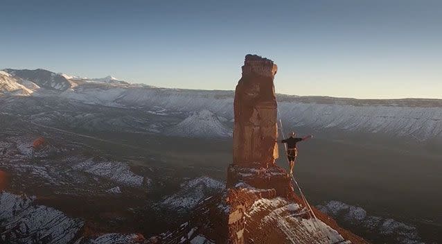 The incredible aerial footage shows Theo Sanson teetering 120 metres above the ground. Photo: Screenshot