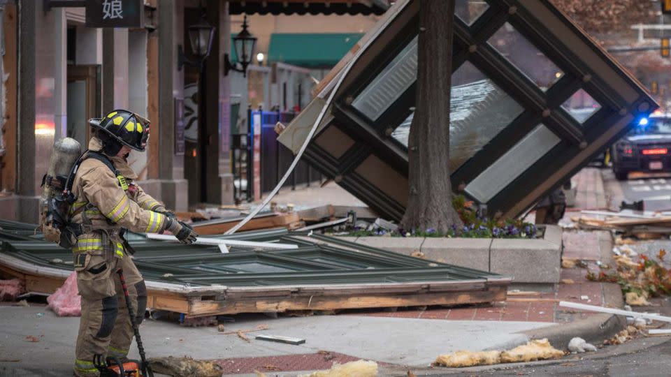 A piece of the Sandman Signature hotel was flung toward the street during the blast. - Peter Matthews/Fort Worth Fire Department