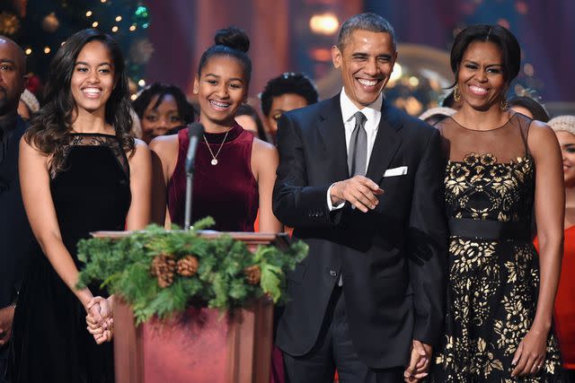 <p>Theo Wargo/WireImage</p> The Obama family in December 2014