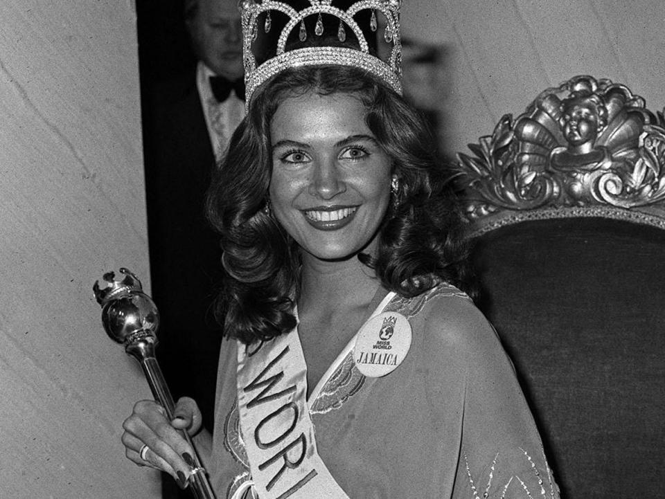 Cindy Breakspeare, 21, sitting on a throne after winning the 1976 Miss World beauty contest.