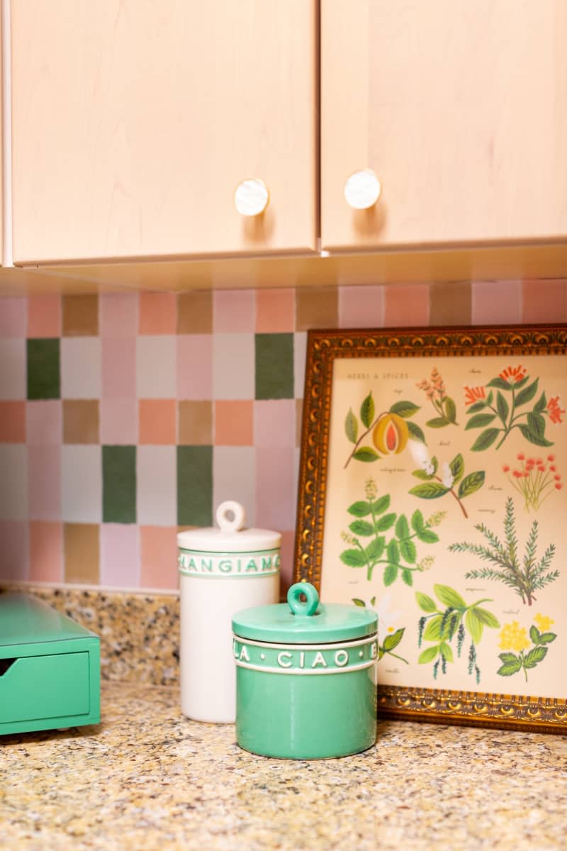 White and teal countertop containers.