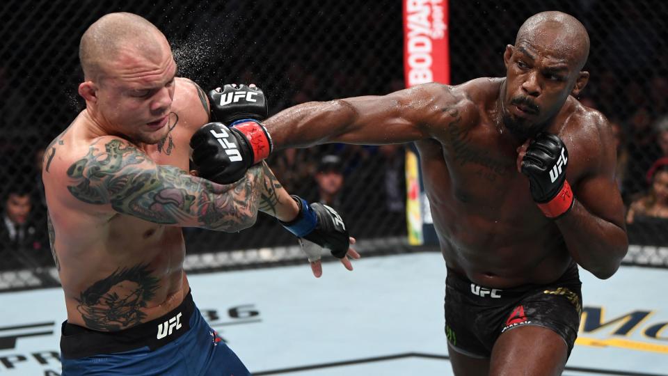 Anthony Smith absorbs a punch from Jon Jones at UFC 235. (Zuffa LLC)