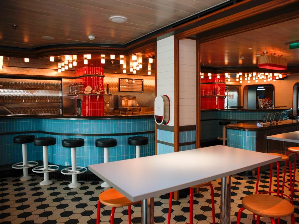 a food counter with tables