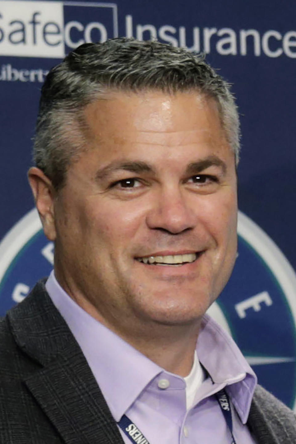 FILE - This is a June 16, 2018, file photo showing Seattle Mariners amateur scouting director Scott Hunter during a news conference in Seattle. Hundreds of young baseball players who would usually be celebrating being drafted by major league teams are now in limbo after the Major League Baseball draft was shortened from 40 rounds to five because of the coronavirus pandemic. "I do see college baseball getting into a little bit of a logjam over the next probably 18 months," Hunter said. (AP Photo/John Froschauer, FIle)