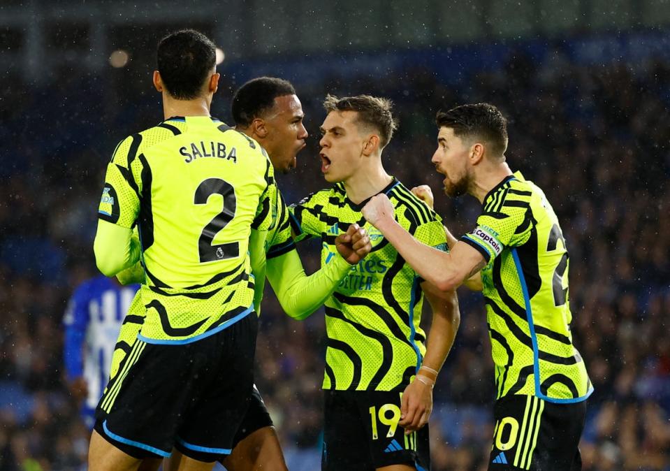 Gabriel Magalhaes (second left) celebrates after blocking a Brighton shot in the 90th minute (Action Images via Reuters)